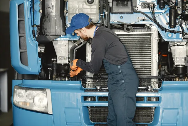 mechanic, maintenance, truck, automotive, engine, repair, service, professional, technique, worker, powerunit, oil filter, service station, technical inspection, employee, diagnostics, job, engine repair, work uniform. British Columbia garage door service truck CVIP thresholds and insurance