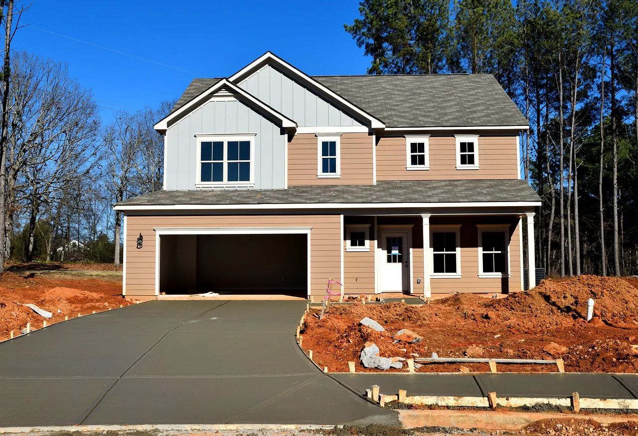 house, family, architecture, suburb, roof, window, home, facade, driveway, wood, porch, door, garage, exterior, outdoors, brick, residential, real estate, luxury home, nature, building, modern, new, construction, sky, front, style, design, grass, property, city, concrete. Garage door service insurance: coverage explained and priced
