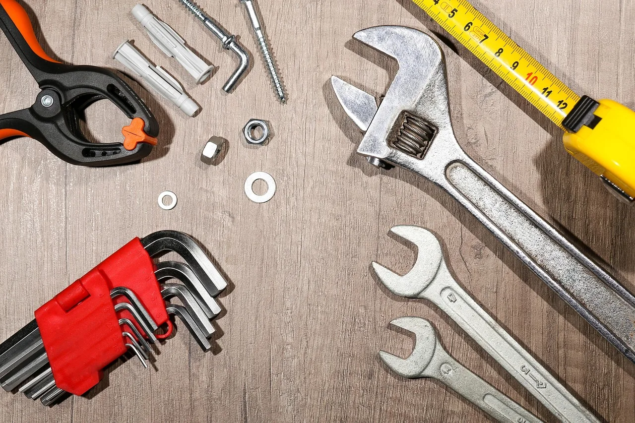 tool, work, repair, roulette, wrench, adjustable wrench, screw, washer, set of hexagons, repair, repair, repair, repair, repair, wrench, wrench, wrench. Seven Stages of Garage Door Service Hiring