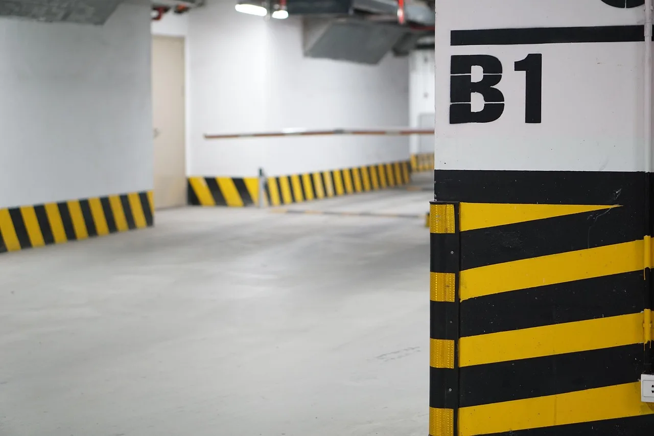 parking lot, underground, garage, car lot, parking lot, parking lot, parking lot, parking lot, parking lot, garage, garage. Seven gates stand between an idea and a working garage door crew