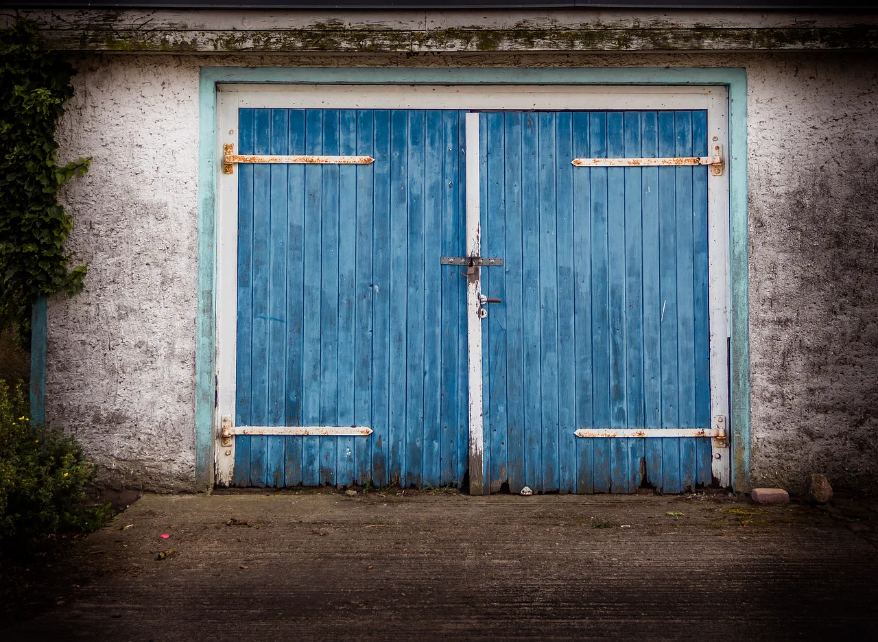 old gate, windows wallpaper, old garage, wooden door, wooden gate, wallpaper hd, wrought iron, full hd wallpaper, 4k wallpaper, desktop backgrounds, gate, door, entrance, beautiful wallpaper, wood, house, free wallpaper, old door, mac wallpaper, 4k wallpaper 1920x1080, weathered, building, cool backgrounds, laptop wallpaper, hd wallpaper, wallpaper 4k, background, expired, old, dandruff, rust, house entrance, facade, blue, antique, disintegration, free background, texture. Winter spring and opener pricing for garage door work in Winnipeg and Edmonton
